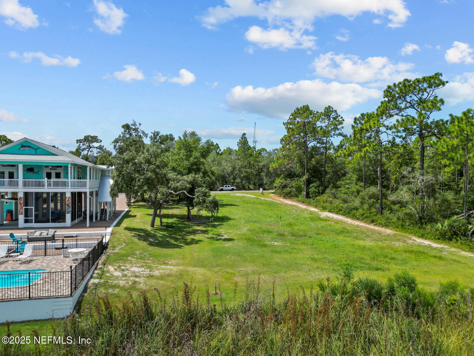 0 Southwest 279th Avenue Steinhatchee, FL 32359 - Photo 9 of 20 a swimming pool with trees in the background