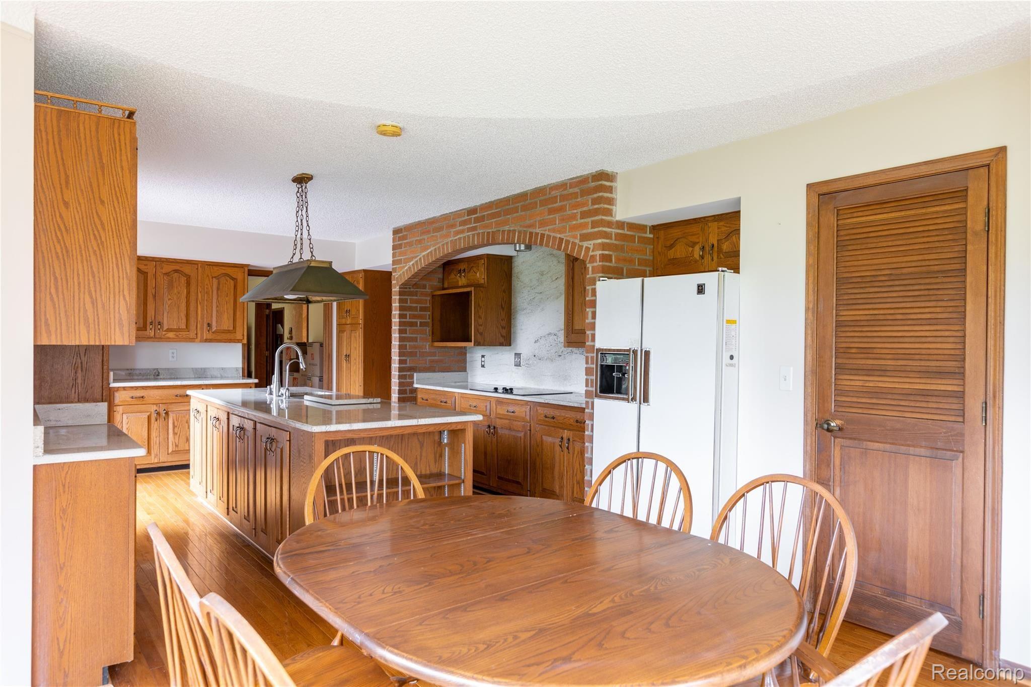 25728 Meridian Road Grosse Ile, MI 48138 - Photo 16 of 49 Kitchen Nook with door to Walk Thru Pantry