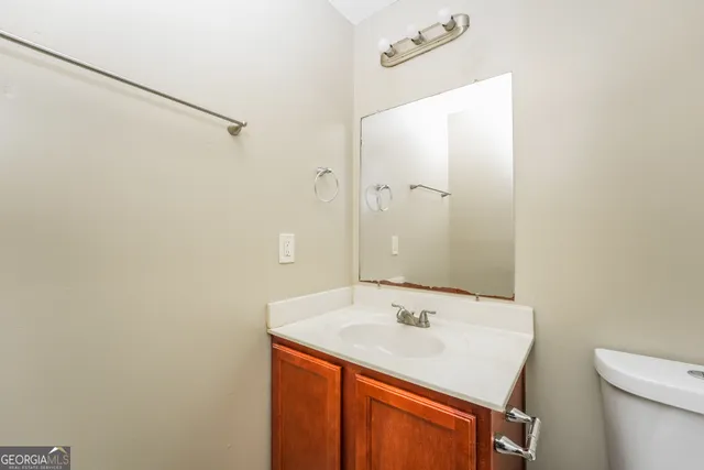 a view of a backyard with sitting area