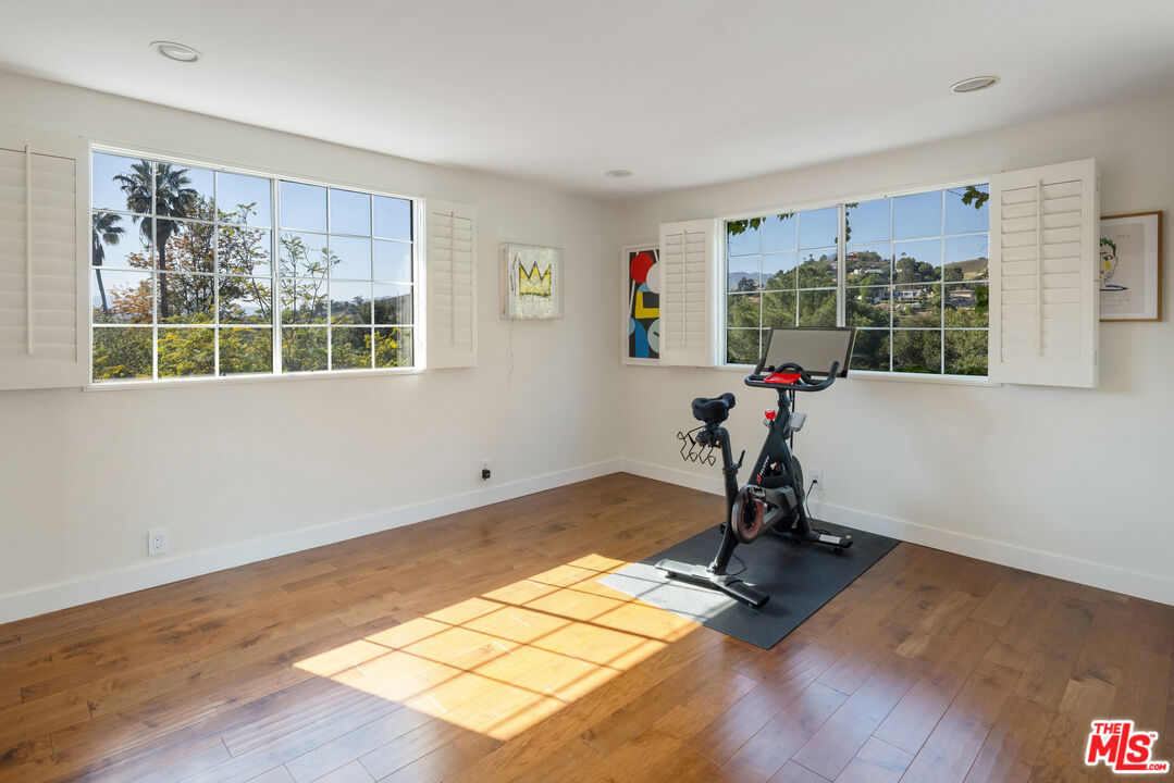 9732 Rotta Avenue Sunland, CA 91040 - Photo 14 of 22 a view of a room with gym equipment and a window
