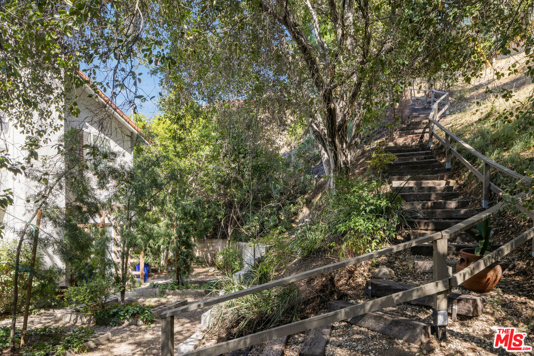 9732 Rotta Avenue Sunland, CA 91040 - Photo 19 of 22 a view of a city with lush green forest