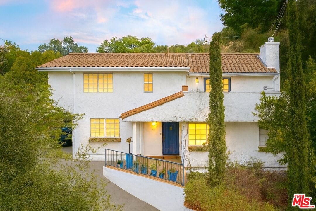 9732 Rotta Avenue Sunland, CA 91040 - Photo 2 of 22 a front view of a house with swimming pool