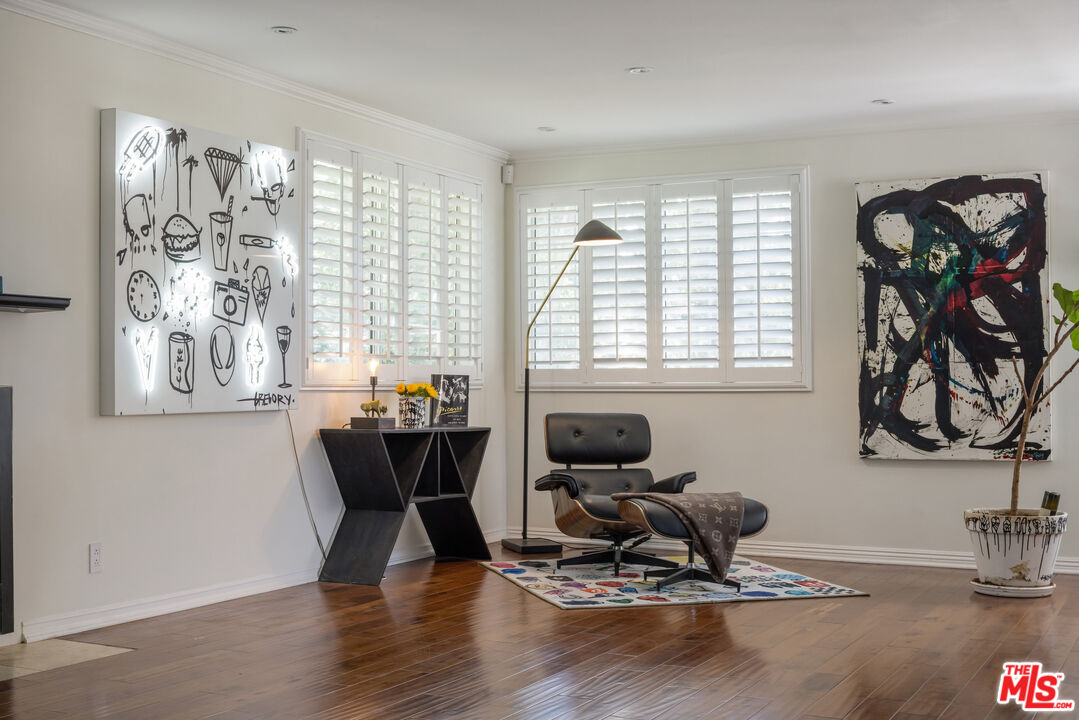 9732 Rotta Avenue Sunland, CA 91040 - Photo 6 of 22 a dining room with wooden floor and large window