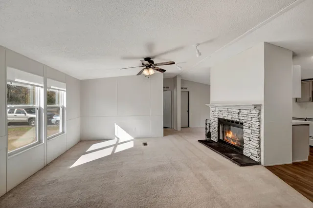 a view of empty room with windows