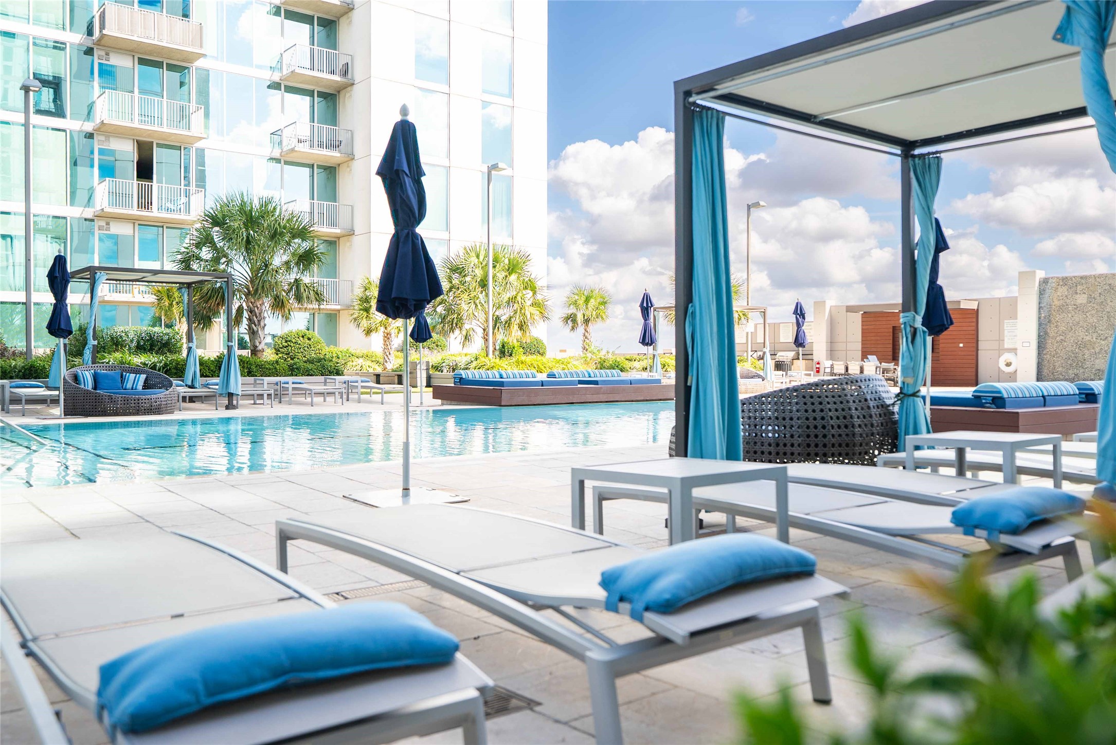 5925 Almeda Road, Unit 12005 Houston, TX 77004 - Photo 22 of 25 a view of swimming pool with outdoor seating and city view