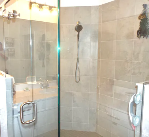 a front view of a house with a large window