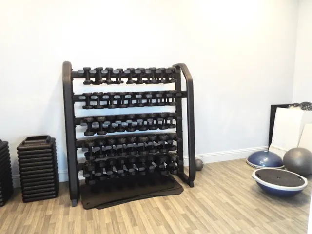 a view of a chairs and table in a patio