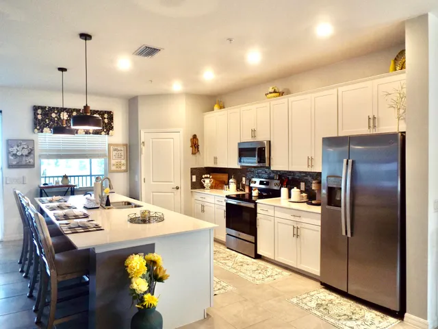 a living room with furniture and a view of living room