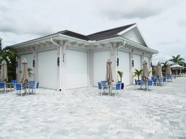 a view of a lake with houses in the back