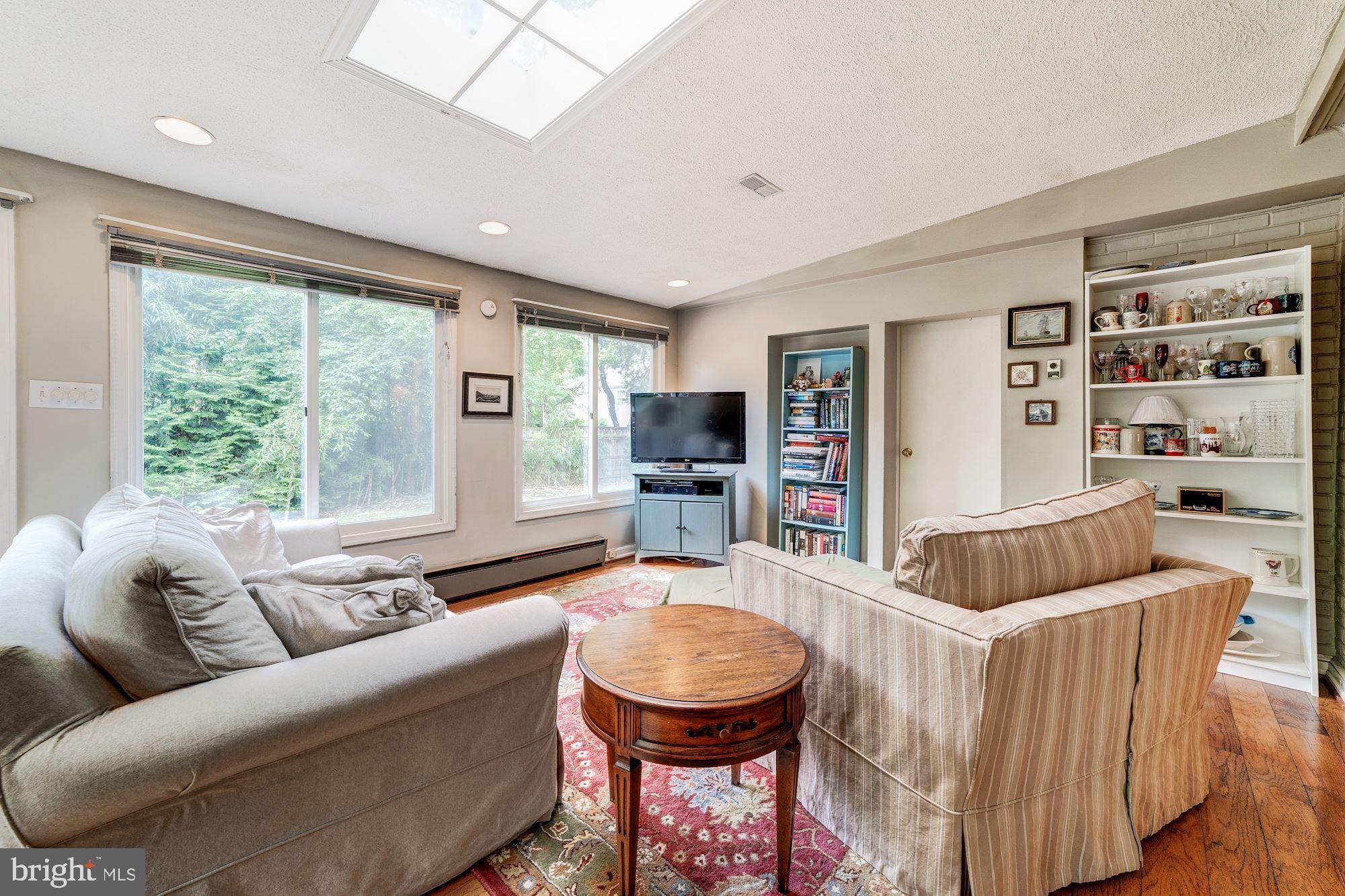 1119 Greenway Road Alexandria, VA 22308 - Photo 13 of 55 Family room with skylight and recessed lights