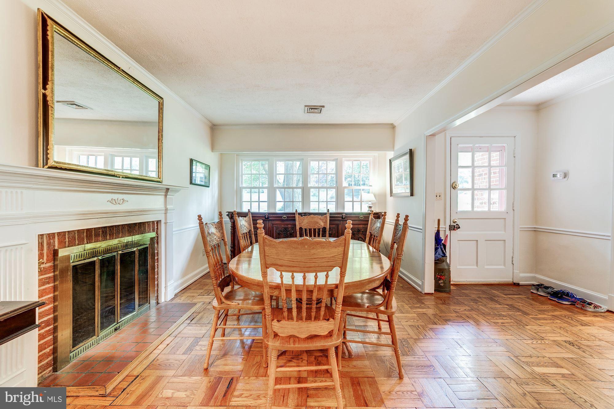 1119 Greenway Road Alexandria, VA 22308 - Photo 5 of 55 Living room/dining room w/ cozy fireplace
