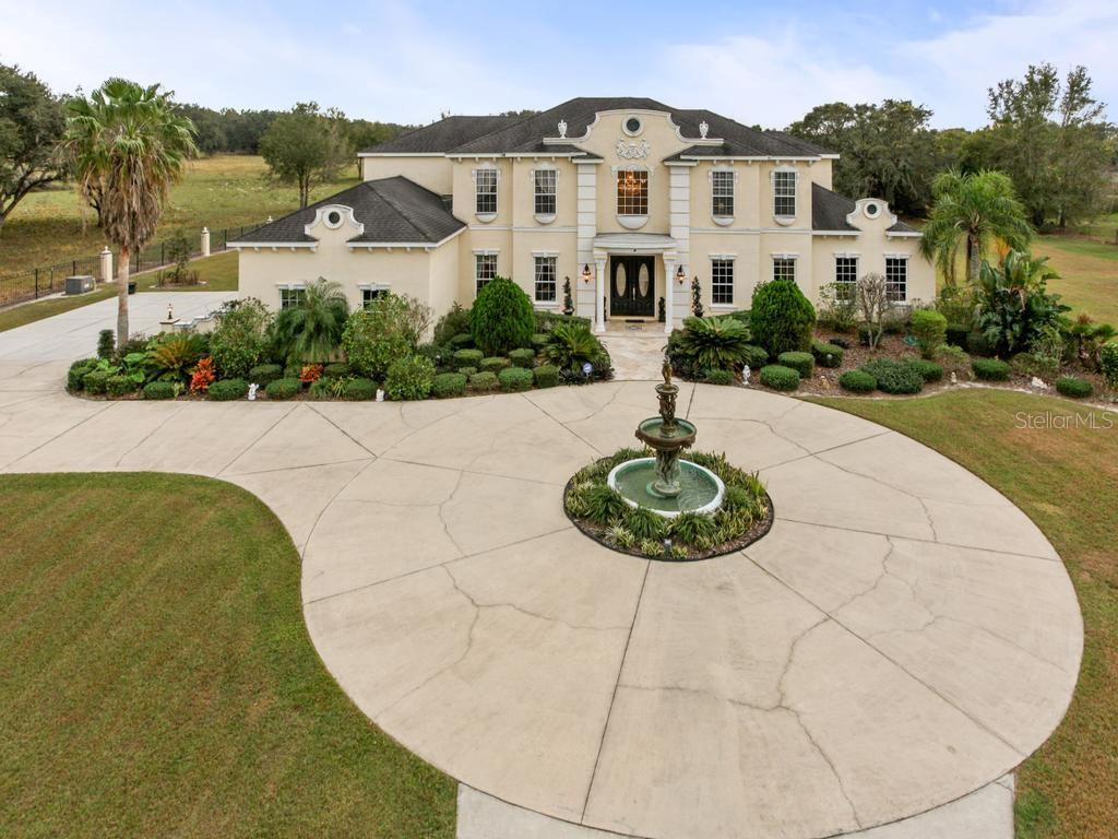 32632 Tyndall Road Wesley Chapel, FL 33545 - Photo 1 of 1 Privately gated custom estate nestled on almost 10 acres in Wesley Chapel!