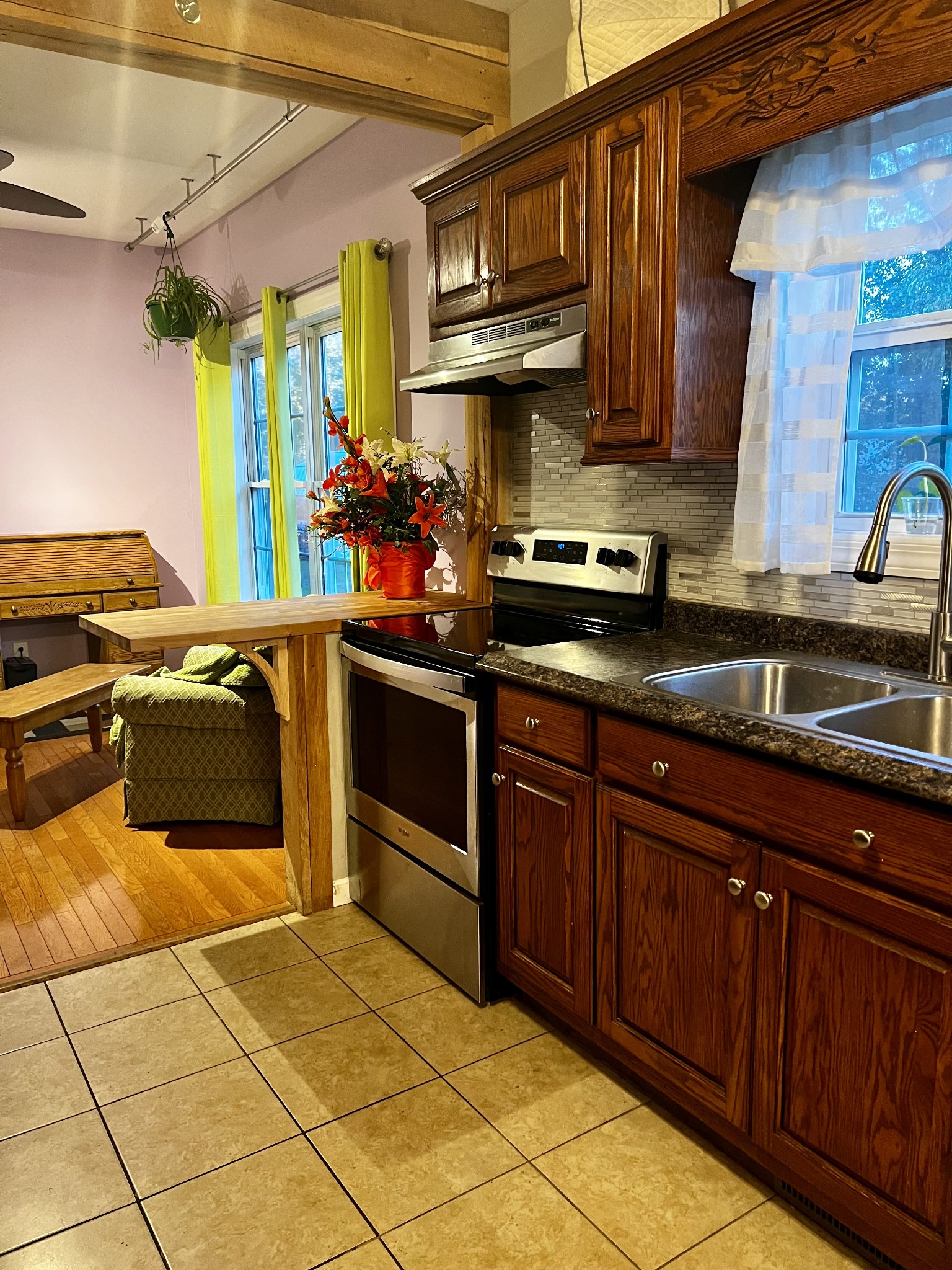 305 Duncan Lane Winchester, TN 37398 - Photo 17 of 34 a kitchen with stainless steel appliances granite countertop a stove a sink and a microwave