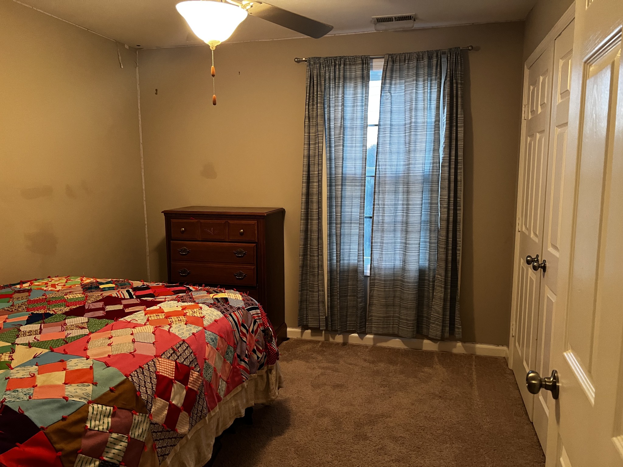 305 Duncan Lane Winchester, TN 37398 - Photo 33 of 34 a bedroom with a bed and a window