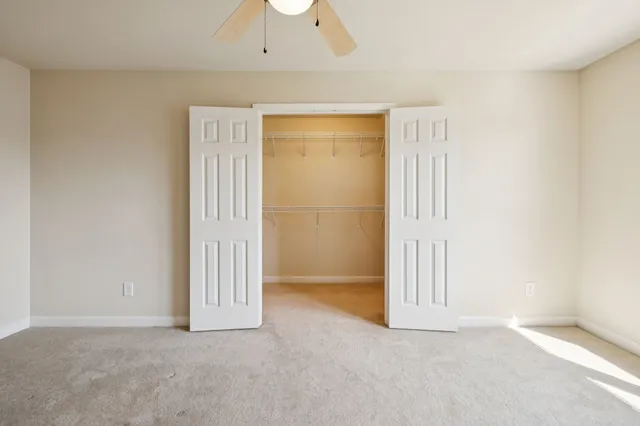 a view of a balcony with wooden floor