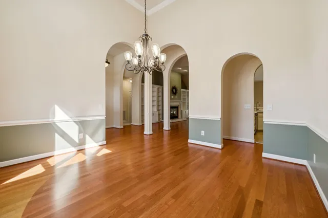 a living room with furniture fireplace and a flat screen tv