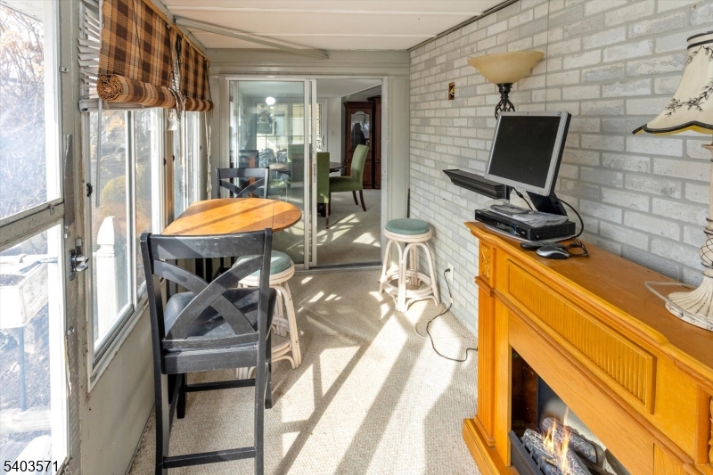 195 West Main Street, Unit G Chester, NJ 07930 - Photo 20 of 23 a bathroom with a sink a mirror and a bath tub