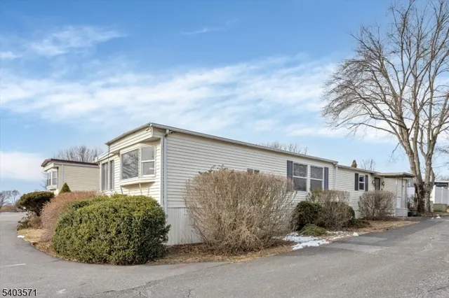 front view of a house with a dry yard