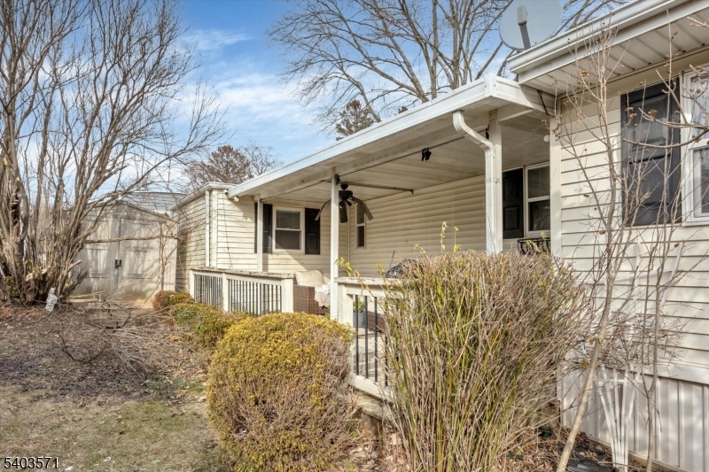 195 West Main Street, Unit G Chester, NJ 07930 - Photo 22 of 23 a front view of a house with a yard