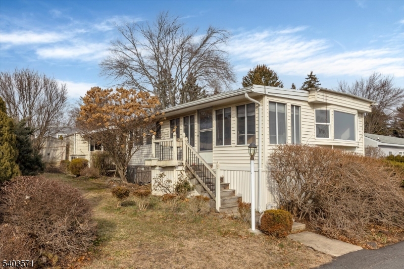 195 West Main Street, Unit G Chester, NJ 07930 - Photo 23 of 23 a view of a house with a yard