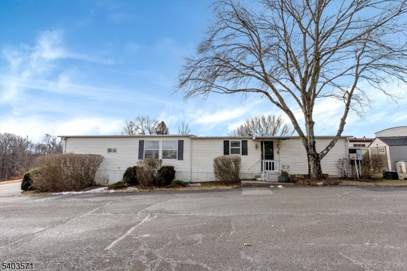 195 West Main Street, Unit G Chester, NJ 07930 - Photo 3 of 23 a view of a car park side of road