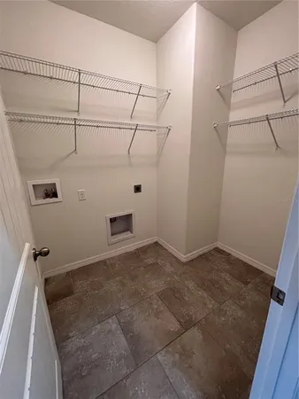 a view of a room with racks on the wall