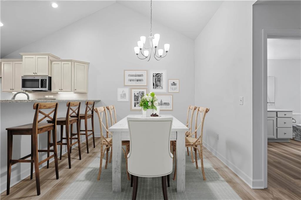 1261 Sandy Rdg Drive Sarver, PA 16055 - Photo 16 of 28 a view of a dining room with furniture and wooden floor