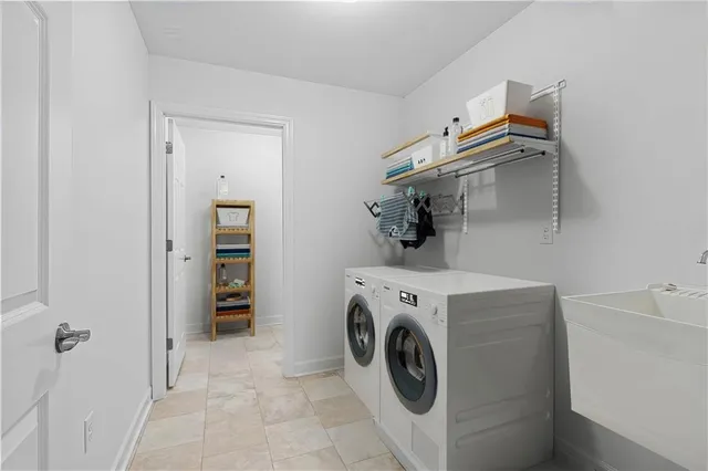 a utility room with dryer and washer