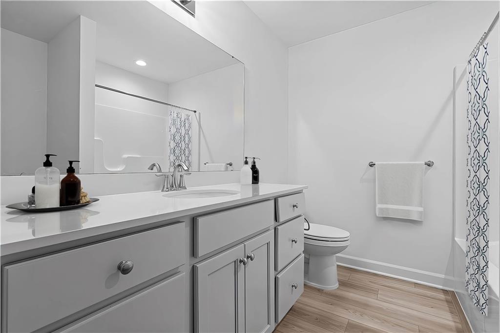 1261 Sandy Rdg Drive Sarver, PA 16055 - Photo 24 of 28 a bathroom with a sink a toilet and a mirror