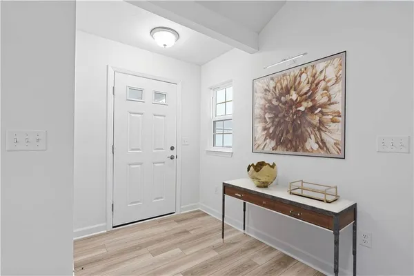 a view of a hallway with workspace