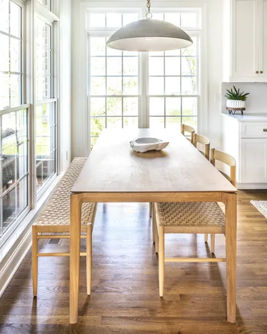 a view of nature from balcony with furniture