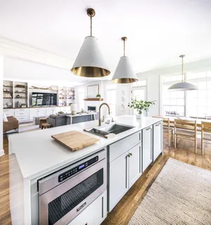 a spacious bedroom with a bed and a couch