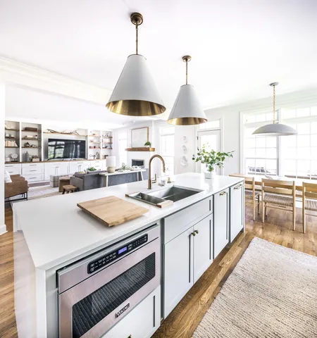 a spacious bedroom with a bed and a couch