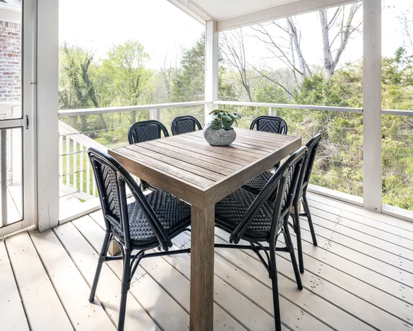 a bathroom with a double vanity sink toilet and a mirror