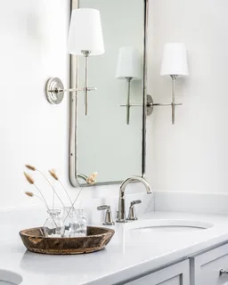 a kitchen with stainless steel appliances granite countertop a sink and a stove
