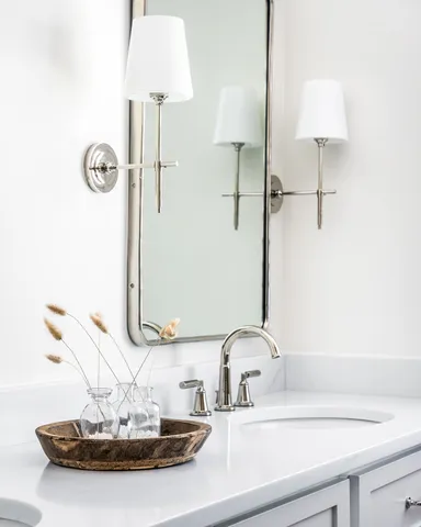 a kitchen with stainless steel appliances granite countertop a sink and a stove
