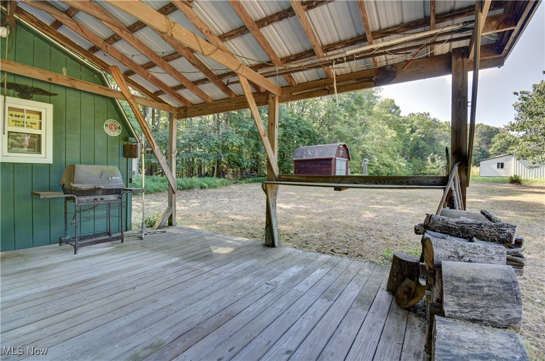 81730 Long Road Freeport, OH 43973 - Photo 6 of 25 Deck featuring area for grilling and a shed