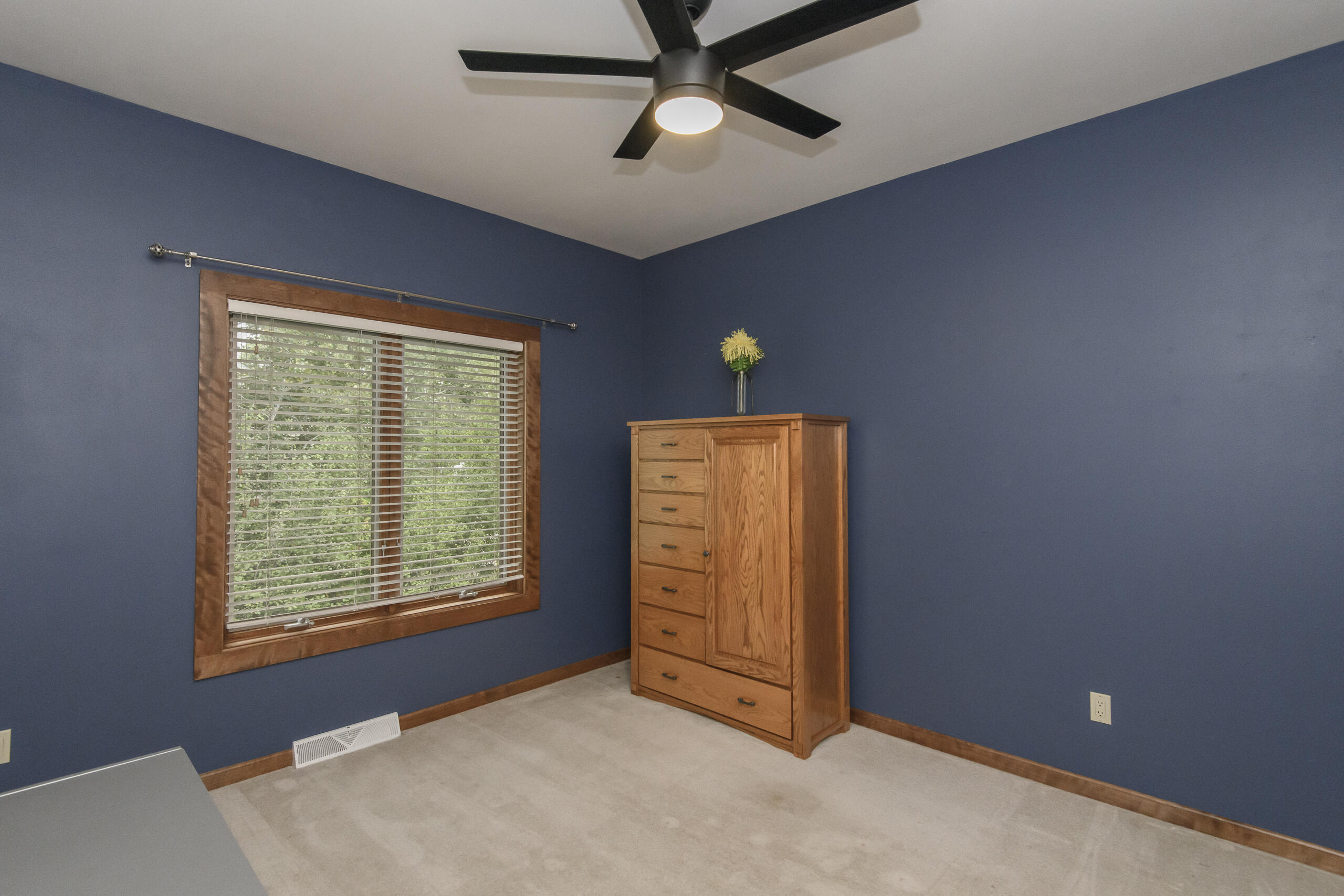 1326 Two Rivers Court Mukwonago, WI 53149 - Photo 32 of 66 Bedroom 3 with wooded view