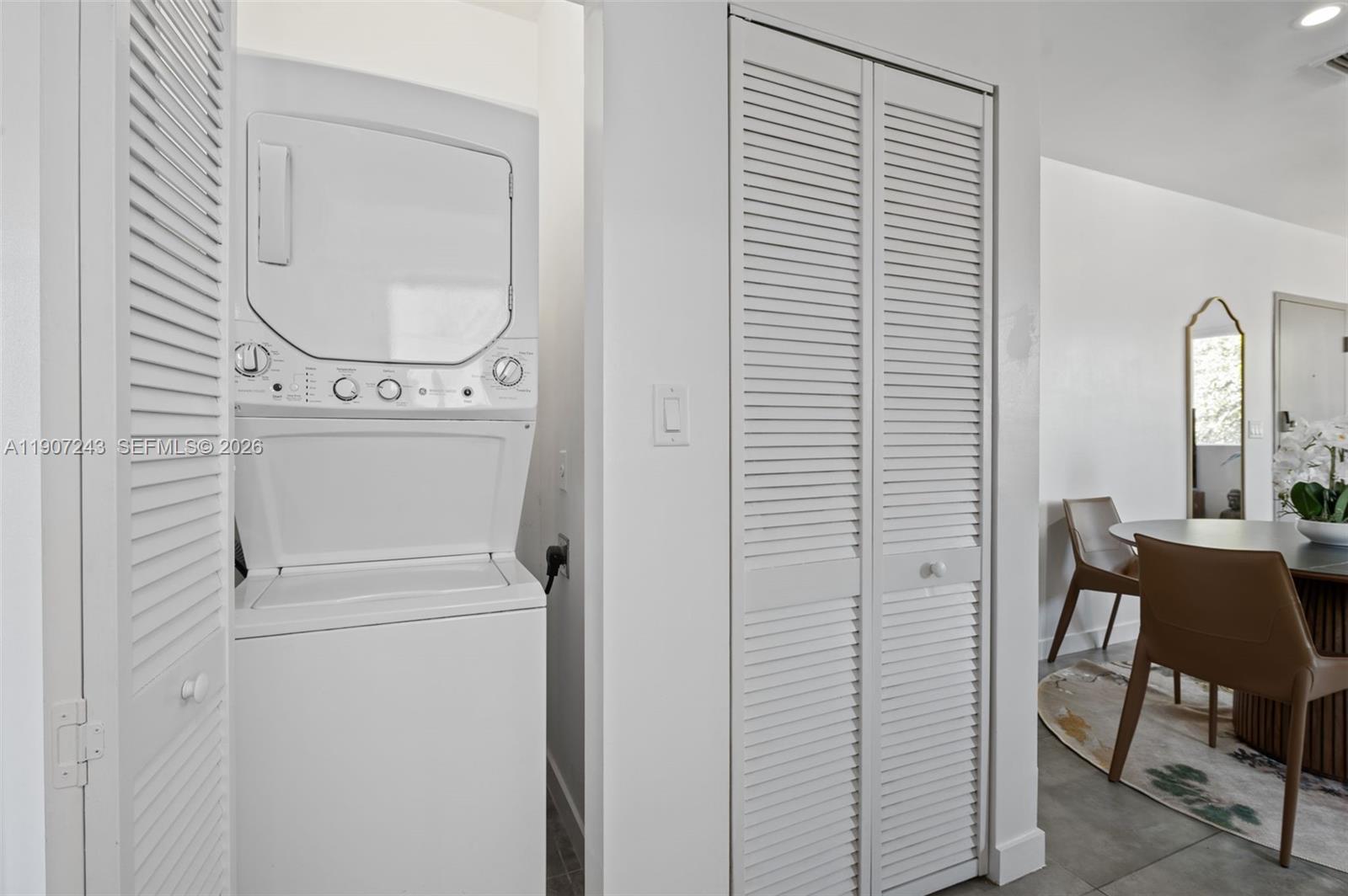 165 Northwest 39th Street, Unit 7 Miami, FL 33127 - Photo 14 of 19 a utility room with dryer and washer