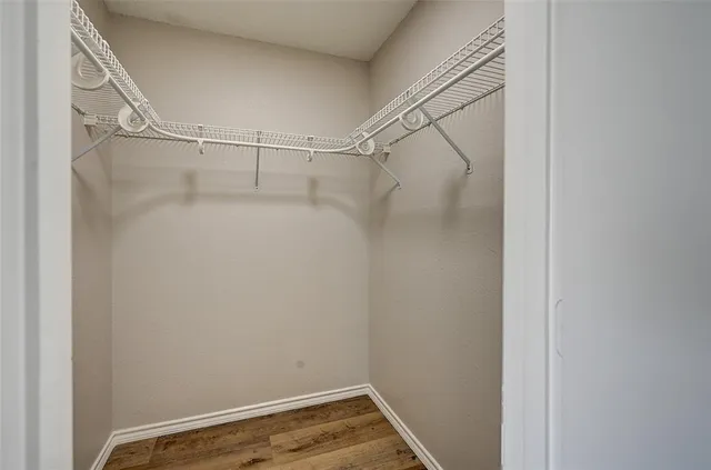 a view of a room with racks on the wall