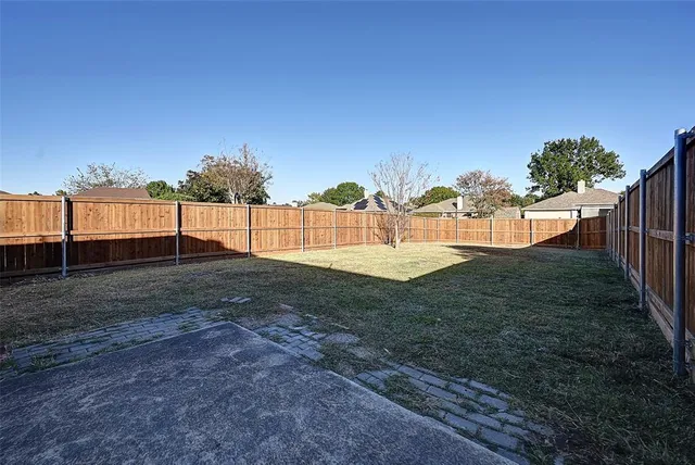 a view of backyard of house