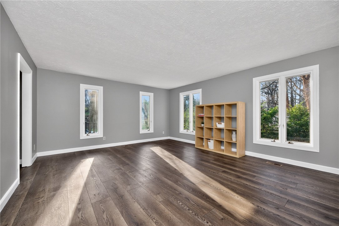 4747 Fawnwood Road Dayton, OH 45429 - Photo 10 of 58 This airy living space features rich wood flooring, crisp trim, and abundant natural light.