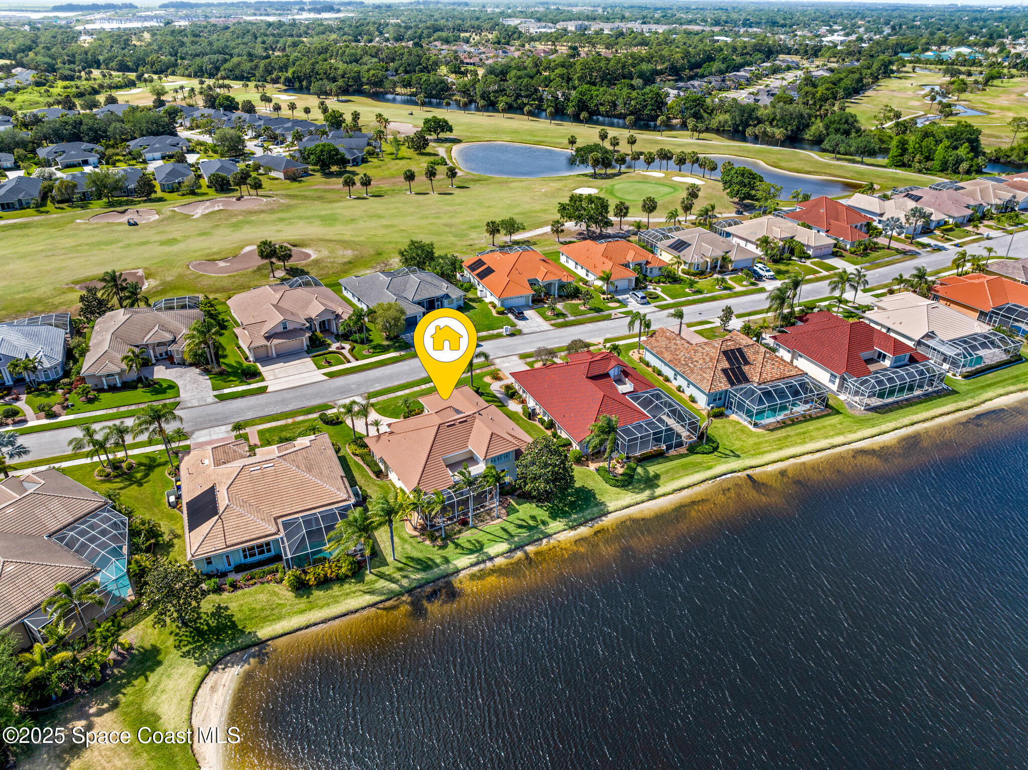4336 Collingtree Drive Rockledge, FL 32955 - Photo 11 of 62 an aerial view of a city with lots of residential buildings ocean and mountain view in back