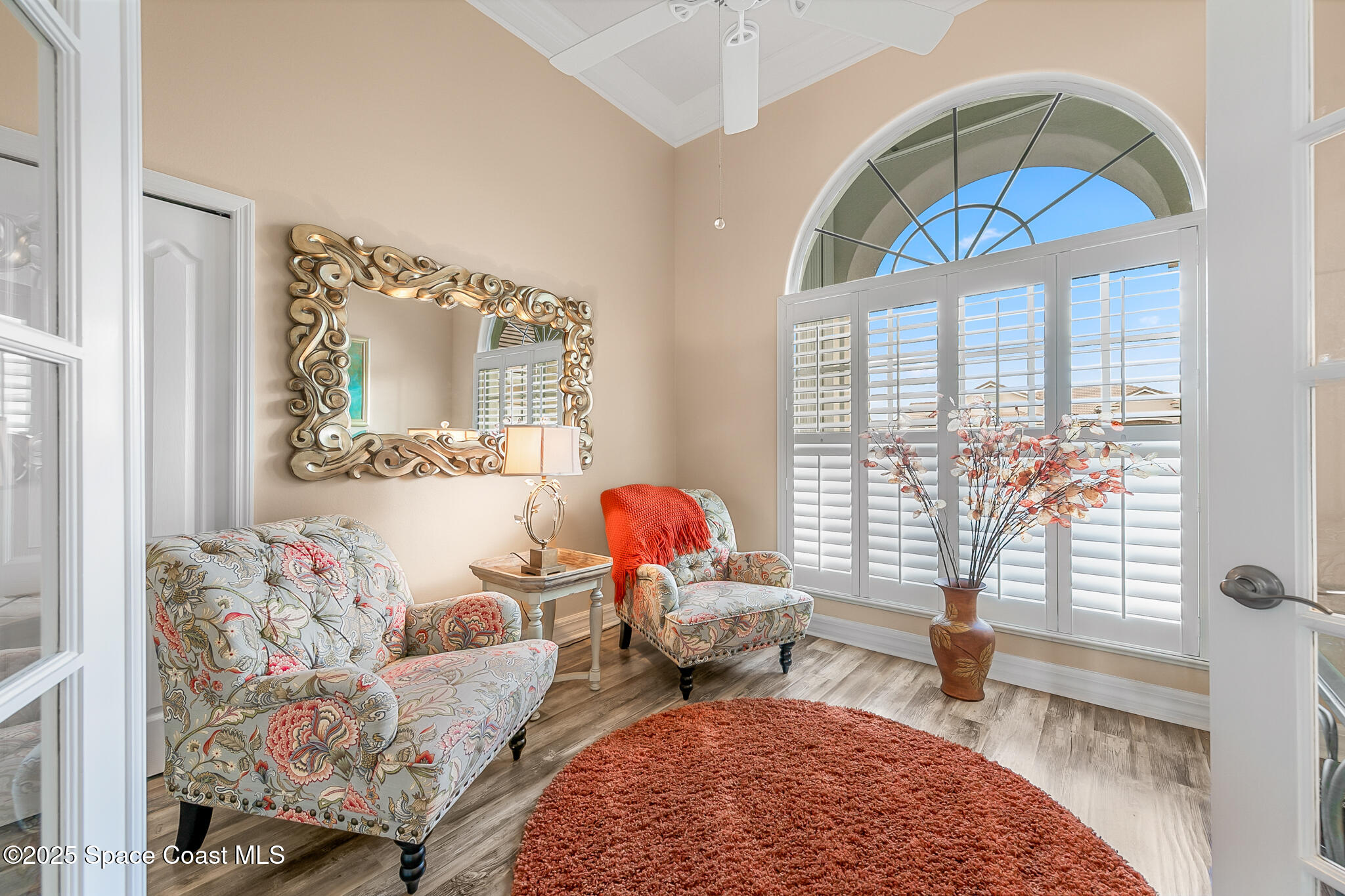 4336 Collingtree Drive Rockledge, FL 32955 - Photo 16 of 62 a living room with furniture and a large window