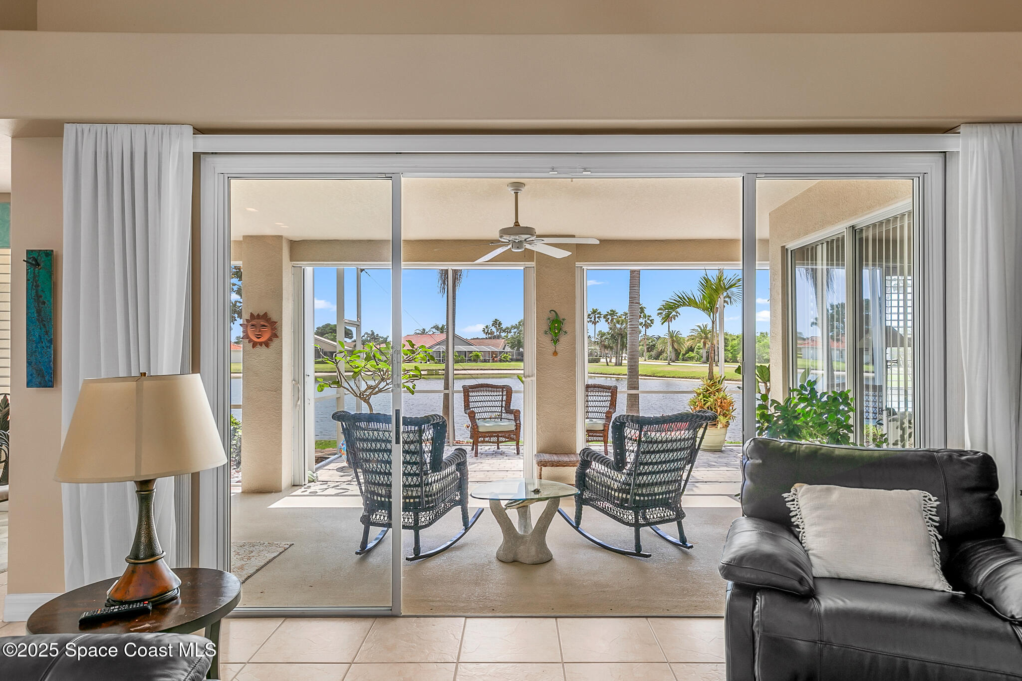 4336 Collingtree Drive Rockledge, FL 32955 - Photo 17 of 62 a living room with furniture and a window