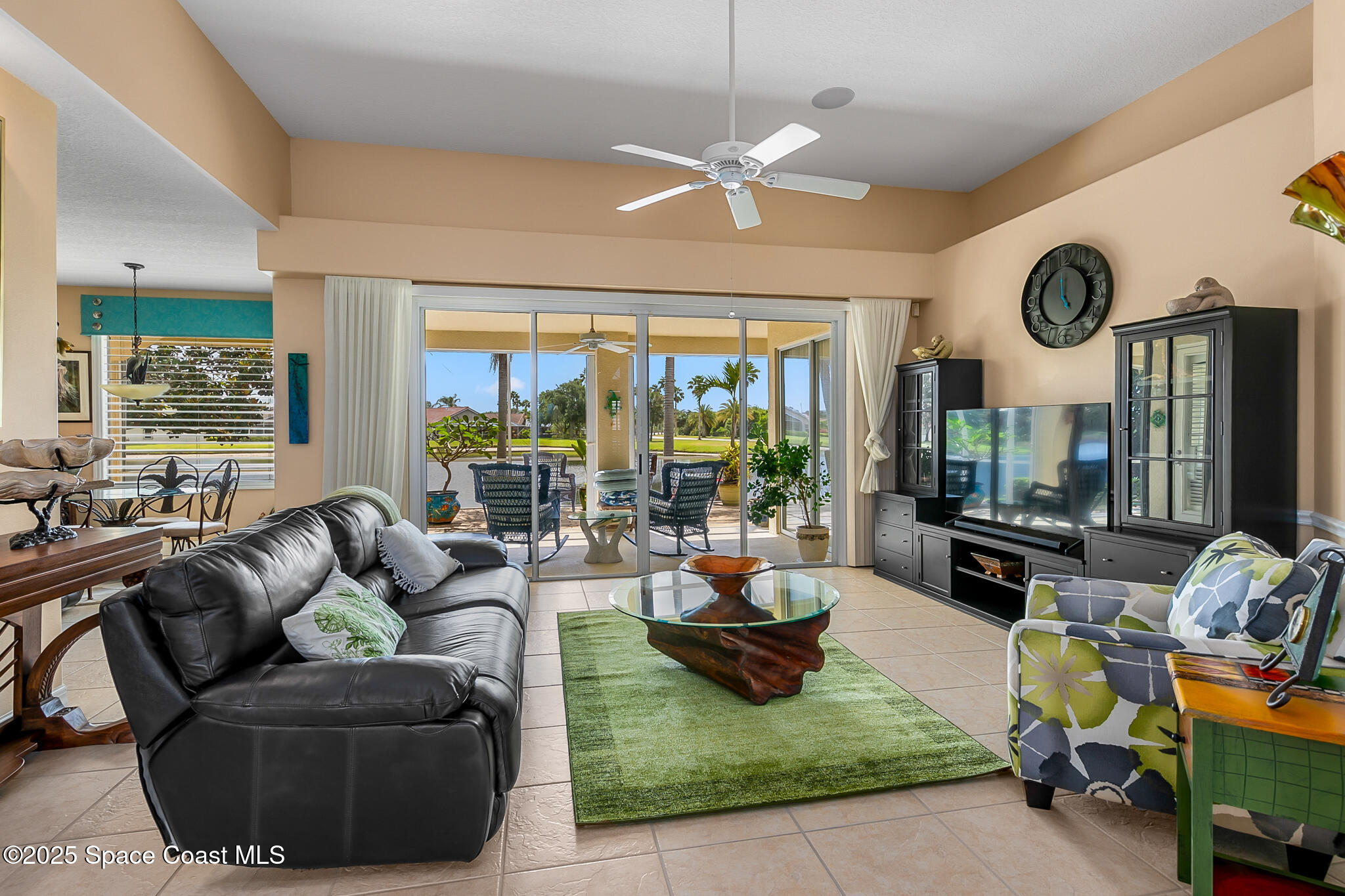 4336 Collingtree Drive Rockledge, FL 32955 - Photo 20 of 62 a living room with furniture and a large window