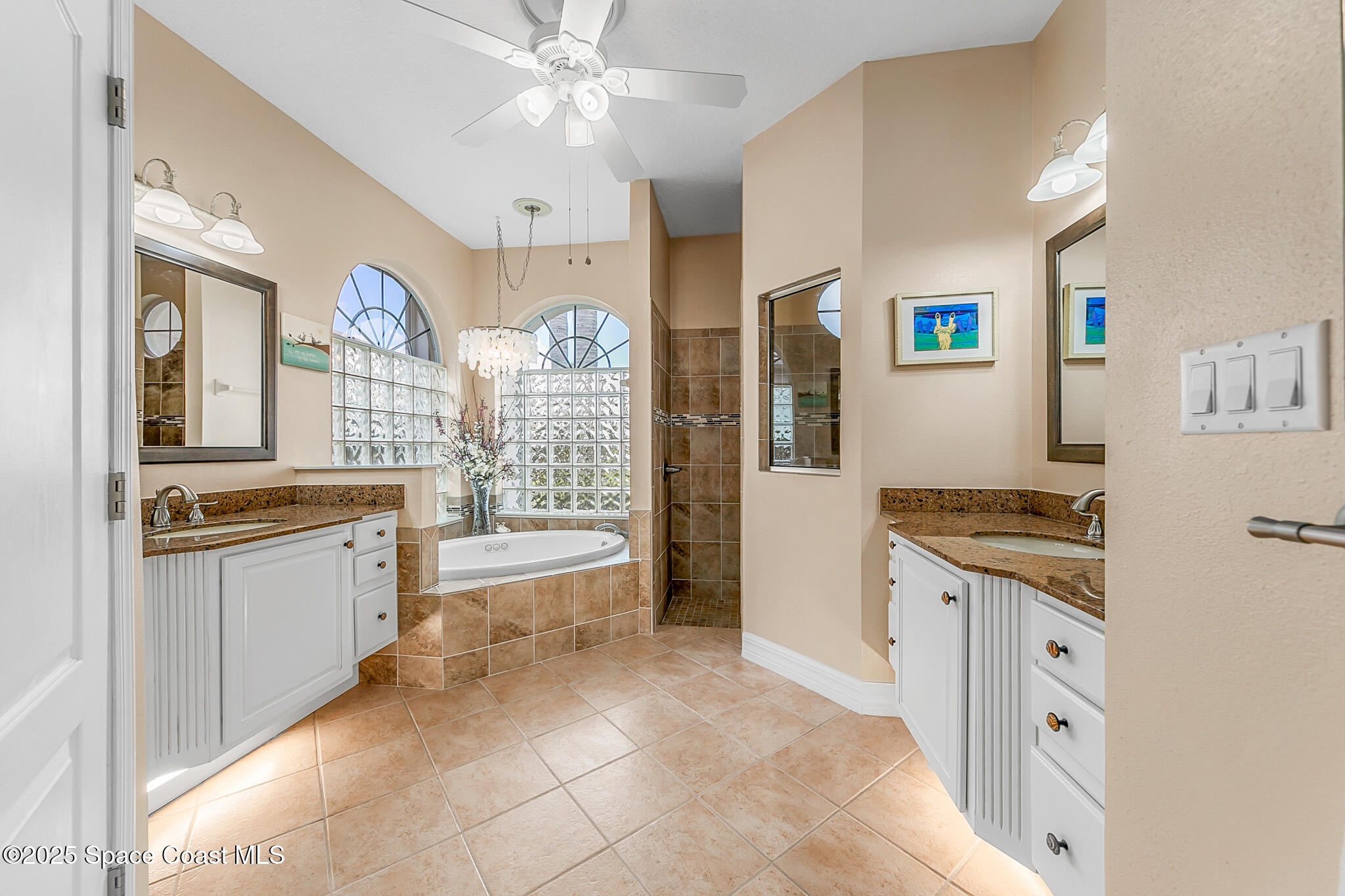 4336 Collingtree Drive Rockledge, FL 32955 - Photo 25 of 62 a large kitchen with granite countertop a stove top oven a sink a dining table and chairs