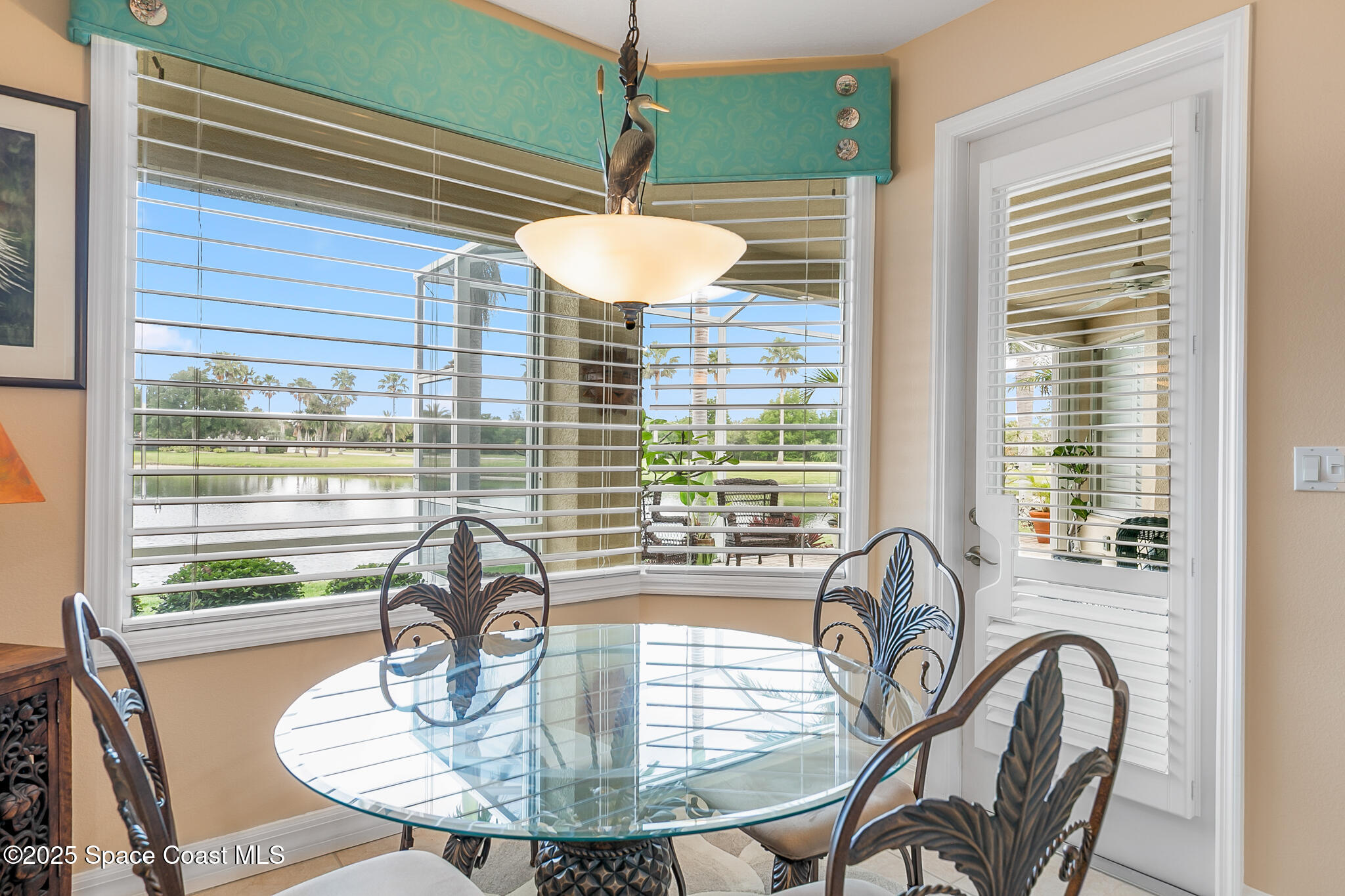 4336 Collingtree Drive Rockledge, FL 32955 - Photo 36 of 62 a table and chairs in a balcony