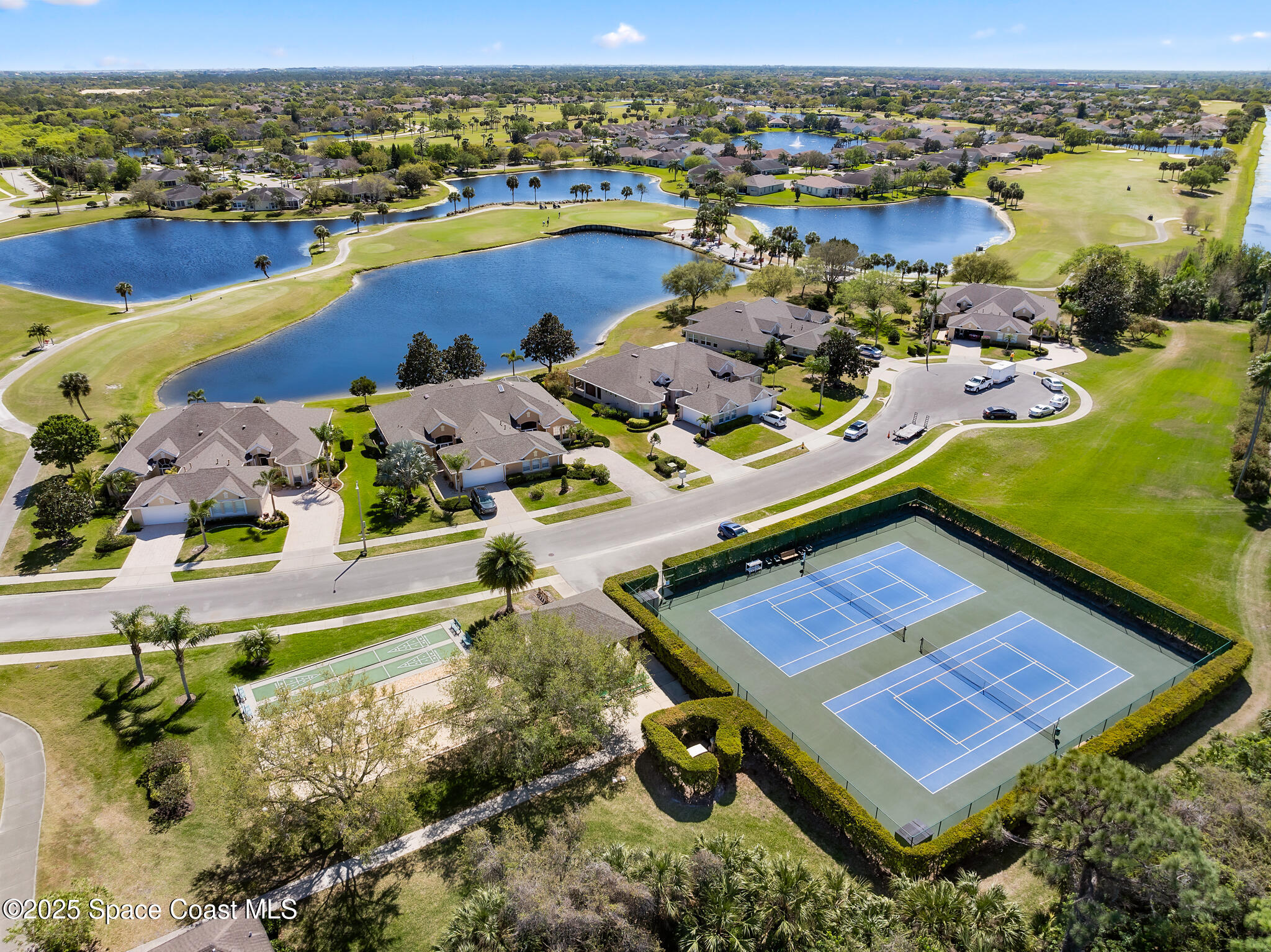 4336 Collingtree Drive Rockledge, FL 32955 - Photo 51 of 62 an aerial view of a pool yard patio and ocean view