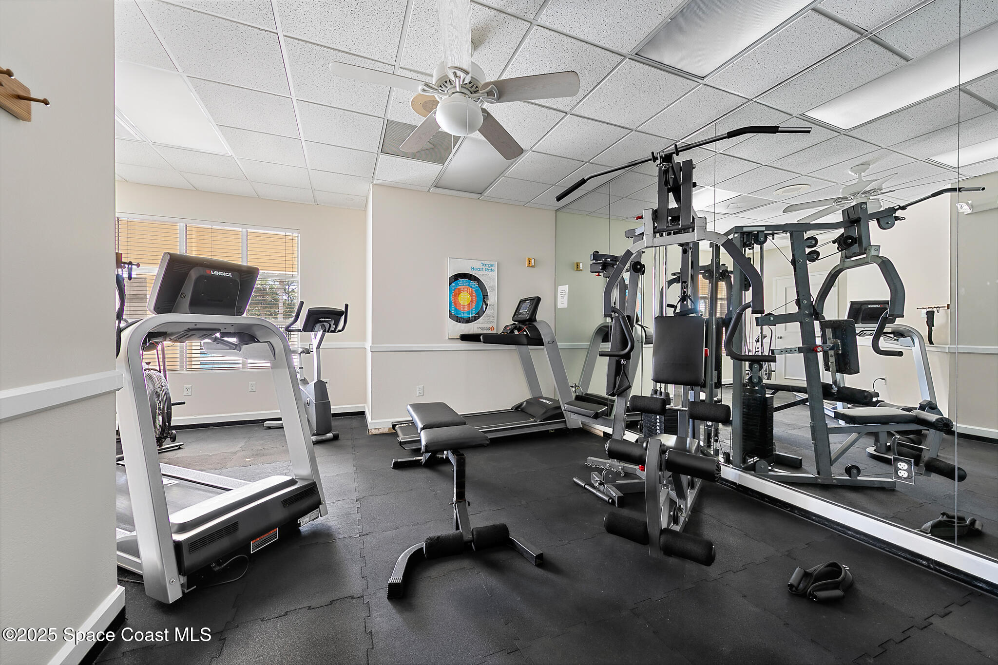 4336 Collingtree Drive Rockledge, FL 32955 - Photo 60 of 62 a view of a room with gym equipment